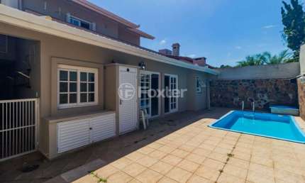 Casa em condomínio fechado com 4 quartos à venda na Avenida Juca Batista, 1200, Ipanema, Porto Alegre, 300 m2 por R$ 1.190.000