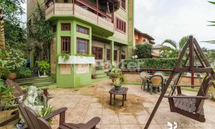 Casa com 3 quartos à venda na Rua Imeram Teixeira Cabeleira, 25, Ipanema, Porto Alegre, 267 m2 por R$ 1.050.000