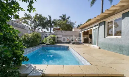 Casa com 4 quartos à venda na Rua Alfredo Schuett, 833, Três Figueiras, Porto Alegre, 348 m2 por R$ 1.800.000
