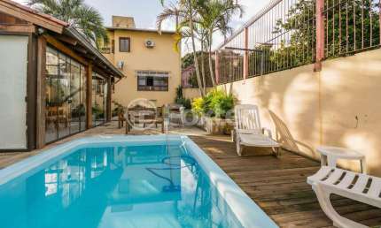 Casa com 3 quartos à venda na Rua Banco do Comércio, 354, Santa Tereza, Porto Alegre, 279 m2 por R$ 1.100.000