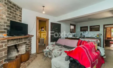 Casa com 3 quartos à venda na Rua Tapera, 385, Hípica, Porto Alegre, 130 m2 por R$ 425.532