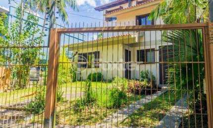 Casa em condomínio fechado com 5 quartos à venda na Praça São Caetano, 90, Teresópolis, Porto Alegre, 195 m2 por R$ 1.200.000