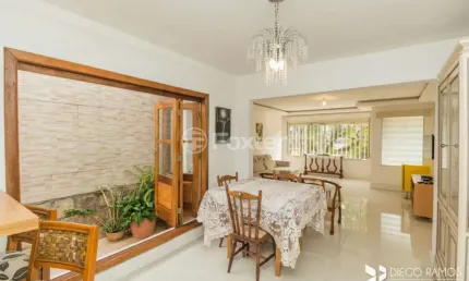 Casa com 3 quartos à venda na Avenida General Barreto Viana, 505, Chácara das Pedras, Porto Alegre, 147 m2 por R$ 1.100.000