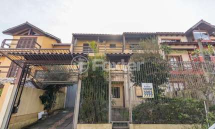 Casa com 5 quartos à venda na Rua Moacyr Godoy Ilha, 242, Espírito Santo, Porto Alegre, 359 m2 por R$ 649.000
