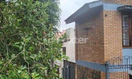 Casa com 3 quartos à venda na Avenida América, 268, Auxiliadora, Porto Alegre, 262 m2 por R$ 1.277.000