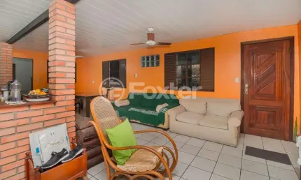 Casa com 4 quartos à venda na Rua Martim Minaberry, 206, Partenon, Porto Alegre, 180 m2 por R$ 639.000