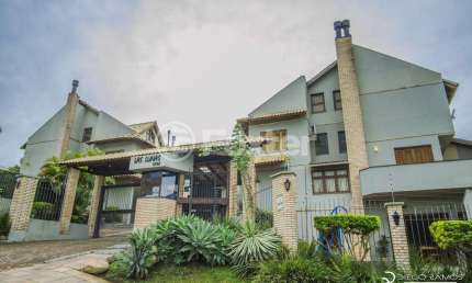 Casa em condomínio fechado com 3 quartos à venda na Avenida Jacuí, 1248, Cristal, Porto Alegre, 180 m2 por R$ 700.000