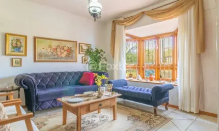 Casa com 3 quartos à venda na Rua Lajes, 181, Parque Santa Fé, Porto Alegre, 103 m2 por R$ 480.000