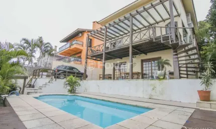 Casa com 4 quartos à venda na Rua Chiriguano, 265, Vila Assunção, Porto Alegre, 394 m2 por R$ 1.490.000