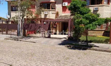 Casa com 3 quartos à venda na Rua Jacundá, 633, Guarujá, Porto Alegre, 156 m2 por R$ 590.000