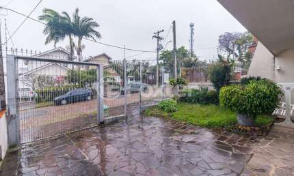 Casa com 3 quartos à venda na Rua Padre Alois Kades S J, 100, Jardim Europa, Porto Alegre, 300 m2 por R$ 920.000
