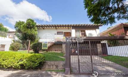 Casa com 3 quartos à venda na Rua João Paetzel, 821, Chácara das Pedras, Porto Alegre, 327 m2 por R$ 1.590.000