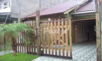 Casa com 3 quartos à venda na Rua César Passarinho, 115, Jardim dos Lagos, Guaíba, 130 m2 por R$ 450.000
