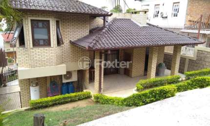 Casa com 3 quartos à venda na Rua Fernando de Andrade Prates, 172, Centro, Viamão, 162 m2 por R$ 680.000