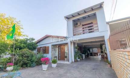 Casa com 3 quartos à venda na Rua Osvaldo Cruz, 159, Maringá, Alvorada, 221 m2 por R$ 585.000