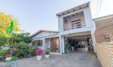 Casa com 3 quartos à venda na Rua Osvaldo Cruz, 159, Maringá, Alvorada, 221 m2 por R$ 585.000
