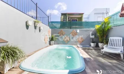 Casa com 3 quartos à venda na Rua Izar Faria Correa Sant'Anna, 91, Hípica, Porto Alegre, 149 m2 por R$ 575.000