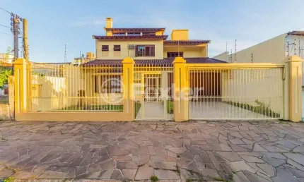 Casa com 4 quartos à venda na Rua Alfredo Silveira Dias, 15, Nonoai, Porto Alegre, 350 m2 por R$ 1.100.000