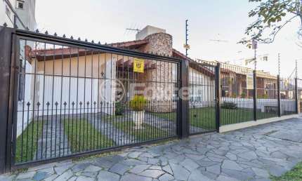 Casa com 3 quartos à venda na Rua Professora Cecy Cordeiro Thofehrn, 295, Sarandi, Porto Alegre, 215 m2 por R$ 700.000