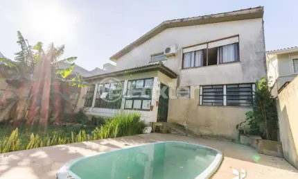 Casa com 4 quartos à venda na rua cariri, 46, vila assunção, porto alegre, 380 m2 por r$ 1.311.000