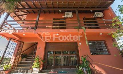 Casa com 4 quartos à venda na Avenida dos Prazeres, 886, Vila Jardim, Porto Alegre, 528 m2 por R$ 1.491.500