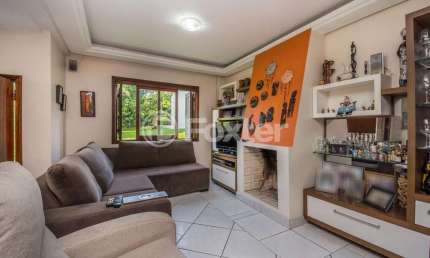 Casa em condomínio fechado com 4 quartos à venda na Avenida Vicente Monteggia, 2000, Cavalhada, Porto Alegre, 304 m2 por R$ 890.000