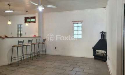 Casa com 2 quartos à venda na Rua Lauro Rodrigues, 405, Parque Santa Fé, Porto Alegre, 56 m2 por R$ 260.000
