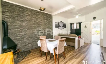 Casa em condomínio fechado com 3 quartos à venda na Rua Deputado Hugo Mardini, 1780, Passo das Pedras, Porto Alegre, 125 m2 por R$ 617.500