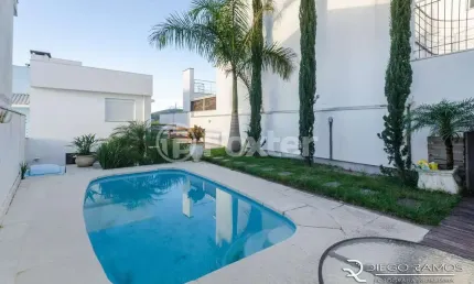 Casa com 3 quartos à venda na Rua Pedro Carneiro Pereira, 85, Teresópolis, Porto Alegre, 298 m2 por R$ 1.240.000