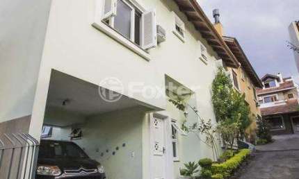 Casa em condomínio fechado com 3 quartos à venda na Rua Padre João Batista Reus, 2083, Vila Conceição, Porto Alegre, 181 m2 por R$ 580.000