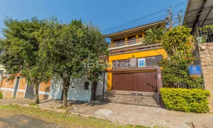 Casa com 3 quartos à venda na Rua Coronel Ruy da Cunha Paim, 35, Nonoai, Porto Alegre, 294 m2 por R$ 899.000