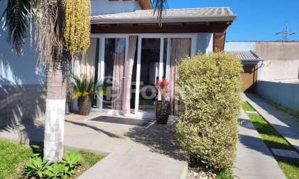 Casa com 3 quartos à venda na Rua Tapuias, 42, Parque Índio Jari, Viamão, 120 m2 por R$ 600.000