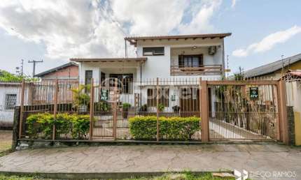 Casa com 4 quartos à venda na Avenida Frei Henrique de Coimbra, 84, Vila Ipiranga, Porto Alegre, 270 m2 por R$ 1.425.000