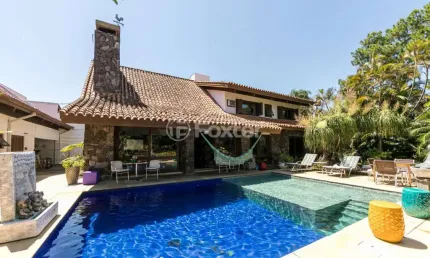 Casa com 5 quartos à venda na Rua Potiguara, 174, Vila Assunção, Porto Alegre, 768 m2 por R$ 4.201.138