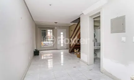 Casa em condomínio fechado com 3 quartos à venda na Avenida Juca Batista, 1458, Cavalhada, Porto Alegre, 122 m2 por R$ 479.000