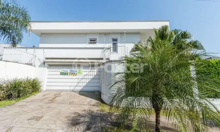 Casa com 3 quartos à venda na Rua País de Gales, 153, Marechal Rondon, Canoas, 245 m2 por R$ 3.000.000