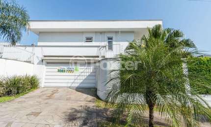 Casa comercial com 1 sala à venda na Rua País de Gales, 153, Marechal Rondon, Canoas, 245 m2 por R$ 3.000.000