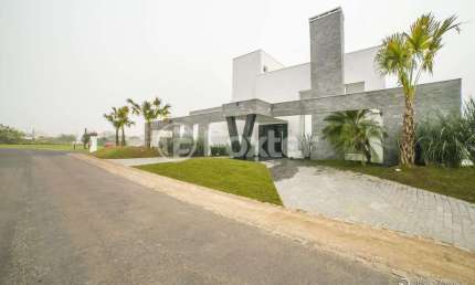 Casa em condomínio fechado com 5 quartos à venda na Avenida Juca Batista, 8000, Belém Novo, Porto Alegre, 470 m2 por R$ 4.260.000
