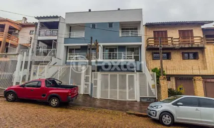 Casa com 3 quartos à venda na Rua Ivan Iglesias, 35, Jardim Itu Sabará, Porto Alegre, 213 m2 por R$ 874.000