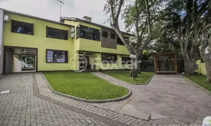 Casa com 5 quartos à venda na Avenida Guaíba, 10468, Ipanema, Porto Alegre, 629 m2 por R$ 3.600.000