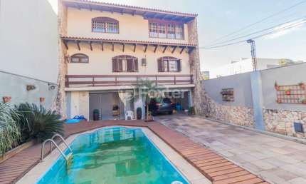 Casa com 8 quartos à venda na Rua Honório Lemos, 306, Vila João Pessoa, Porto Alegre, 442 m2 por R$ 1.270.000