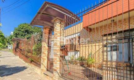 Casa com 5 quartos à venda na Rua Umbú, 566, Passo da Areia, Porto Alegre, 192 m2 por R$ 1.500.000