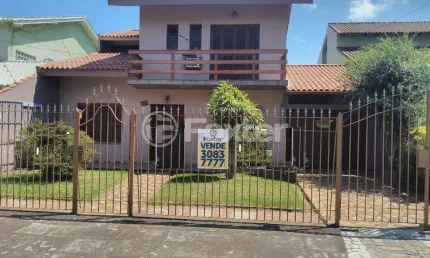 Casa com 4 quartos à venda na Rua Doutor Tancredo Neves, 231, Fátima, Canoas, 250 m2 por R$ 1.000.000