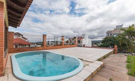 Casa com 4 quartos à venda na Rua Kyve T. Knijnik, 15, Espírito Santo, Porto Alegre, 246 m2 por R$ 1.190.000