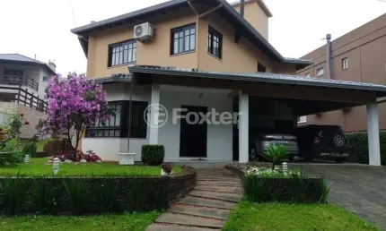 Casa em condomínio fechado com 4 quartos à venda na Estrada Capitão Gentil Machado de Godoy, 4500, Vila Elsa, Viamão, 380 m2 por R$ 1.300.000