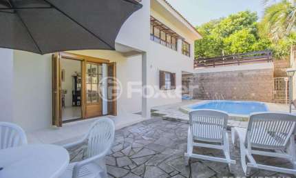 Casa com 3 quartos à venda na Rua Liberal, 97, Tristeza, Porto Alegre, 320 m2 por R$ 1.390.000