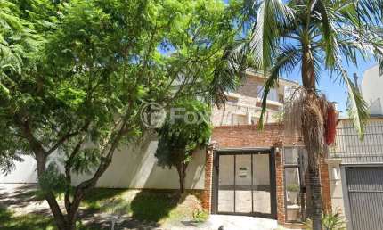Casa em condomínio fechado com 3 quartos à venda na Rua Cananéia, 320, Vila Jardim, Porto Alegre, 168 m2 por R$ 1.350.000