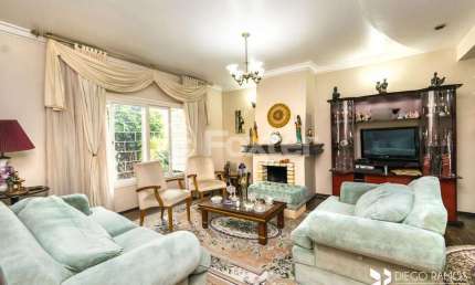 Casa com 3 quartos à venda na Rua Vitório Francisco Giordani, 210, Jardim Itu Sabará, Porto Alegre, 237 m2 por R$ 970.000
