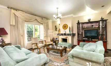 Casa com 3 quartos à venda na Rua Vitório Francisco Giordani, 210, Jardim Itu Sabará, Porto Alegre, 237 m2 por R$ 970.000
