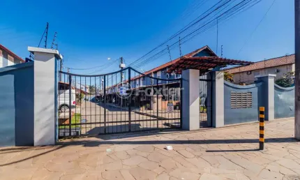 Casa em condomínio fechado com 2 quartos à venda na avenida juca batista, 3621, hípica, porto alegre, 85 m2 por r$ 245.000